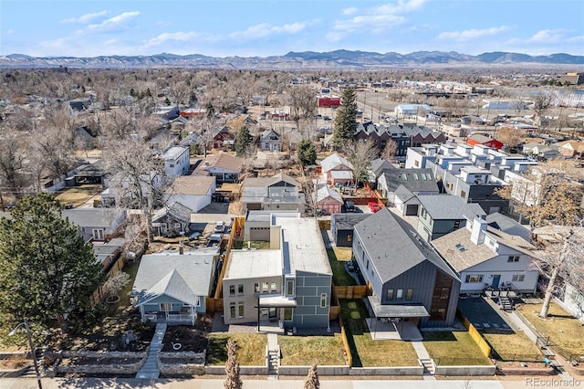 bird's eye view featuring a residential view and a mountain view