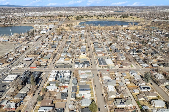 aerial view with a water view and a residential view