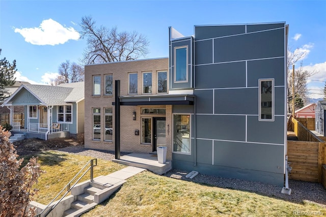 4351 Yates St, Denver, CO 80212 - back of house featuring brick siding and covered porch