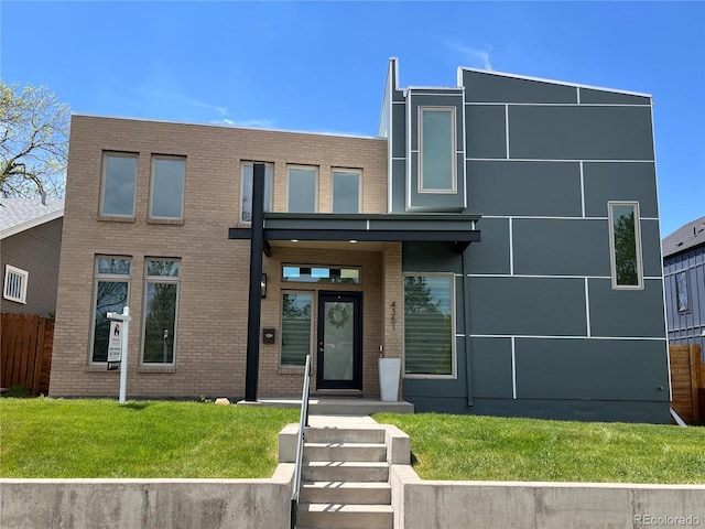 4351 Yates St, Denver, CO 80212 - contemporary house featuring brick siding and a front yard