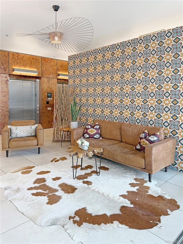 603 Inca St Unit 429, Denver, CO 80204 - living room with elevator and light tile patterned floors