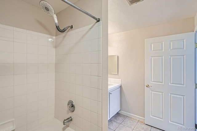 7440 S Blackhawk St Unit 4-102, Englewood, CO 80112 - full bath with  shower combination, tile patterned flooring, and vanity