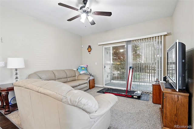 9963 E Carolina Cir Unit 104, Aurora, CO 80247 - carpeted living area featuring ceiling fan and baseboards