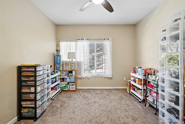9963 E Carolina Cir Unit 104, Aurora, CO 80247 - playroom featuring ceiling fan, carpet flooring, and baseboards