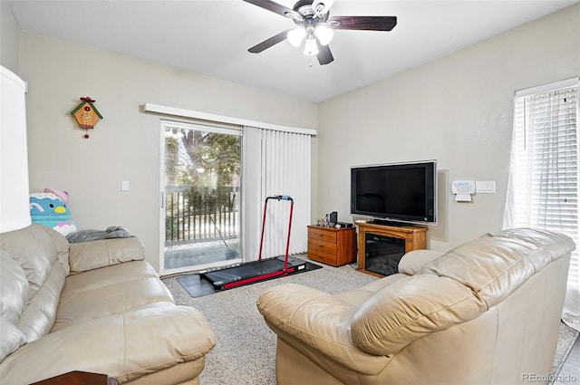 9963 E Carolina Cir Unit 104, Aurora, CO 80247 - carpeted living room with ceiling fan