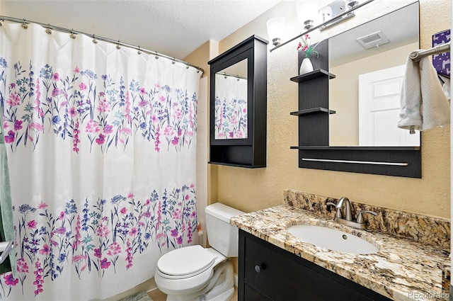 9963 E Carolina Cir Unit 104, Aurora, CO 80247 - full bath featuring a textured wall, toilet, vanity, a textured ceiling, and shower / bathtub combination with curtain