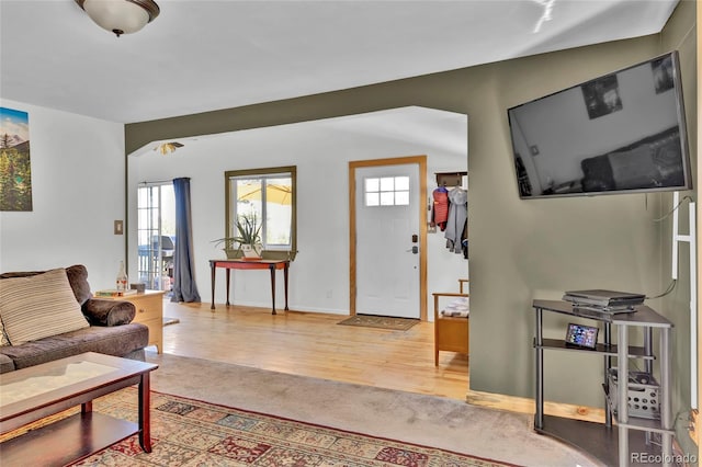 11798 Ridge Rd, Golden, CO 80403 - living room featuring plenty of natural light, wood finished floors, and baseboards