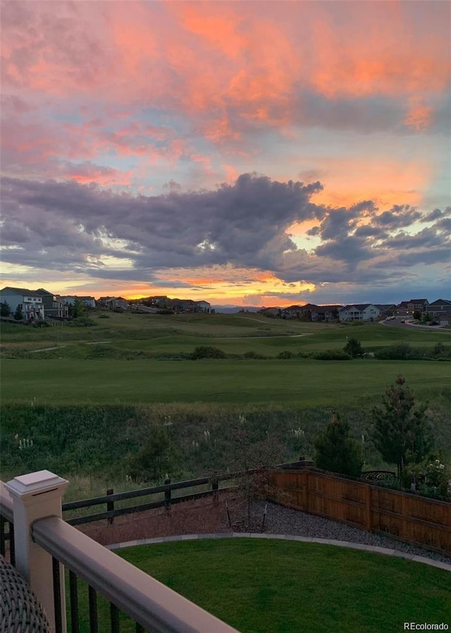 view of yard at dusk