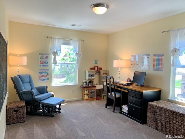 view of carpeted office space