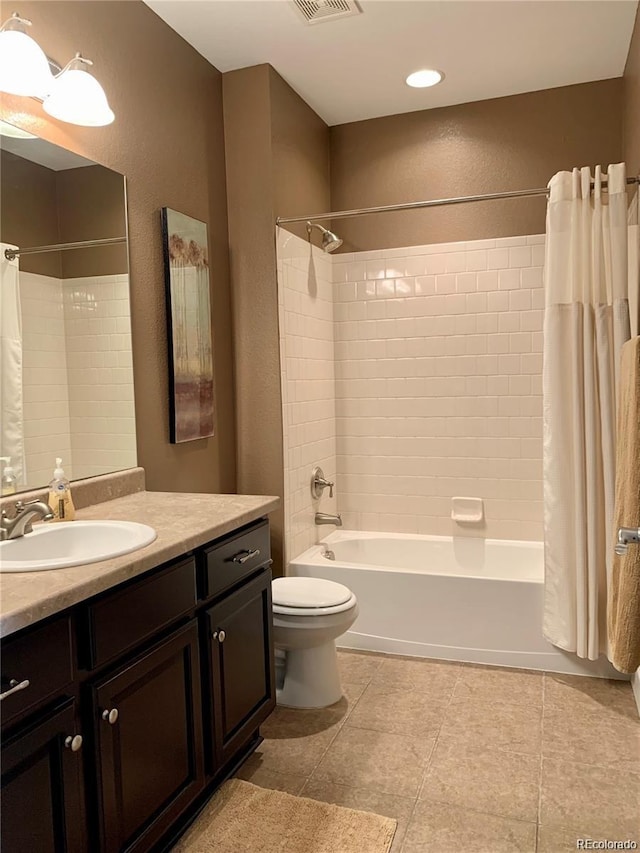 full bathroom with shower / bath combo, toilet, and vanity