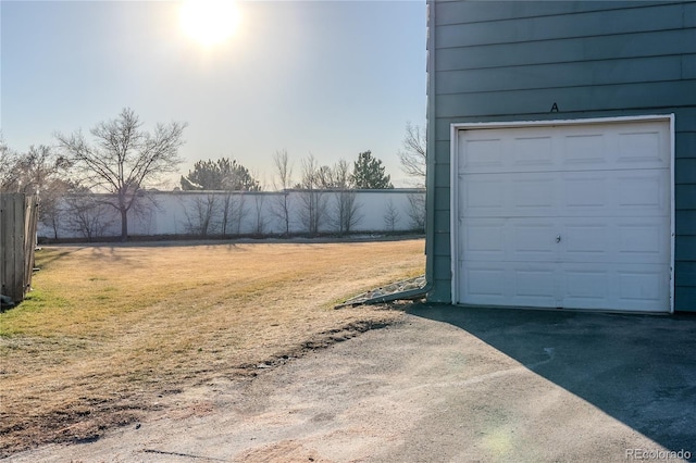 garage with a yard