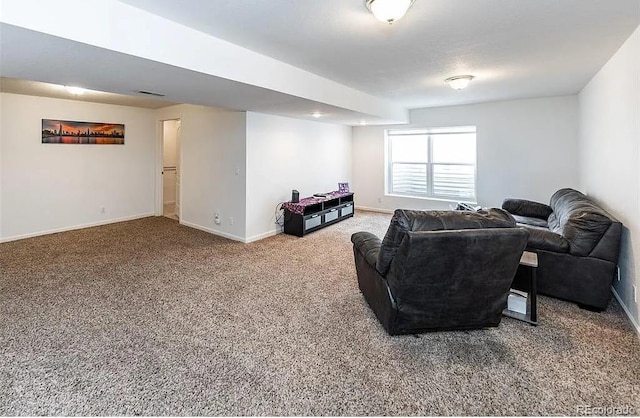 living area featuring carpet, visible vents, and baseboards