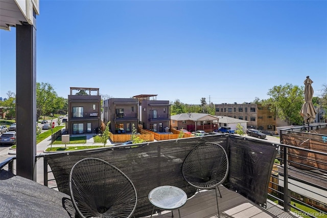 1299 Newton St, Denver, CO 80204 - wooden deck with a residential view