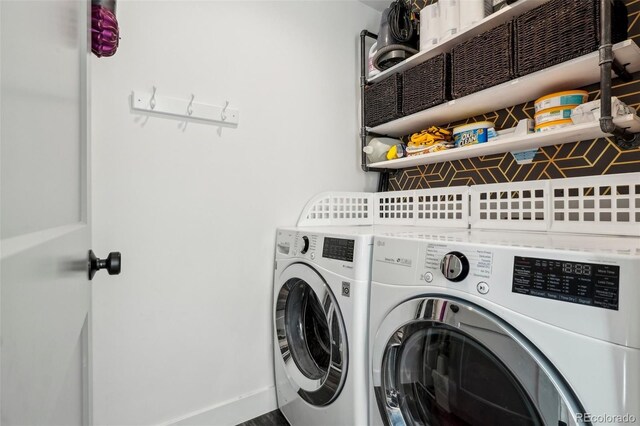1299 Newton St, Denver, CO 80204 - laundry room featuring washing machine and dryer and baseboards
