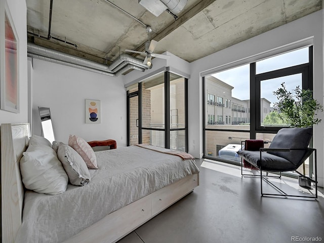 bedroom with concrete floors