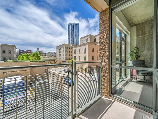 balcony featuring a city view