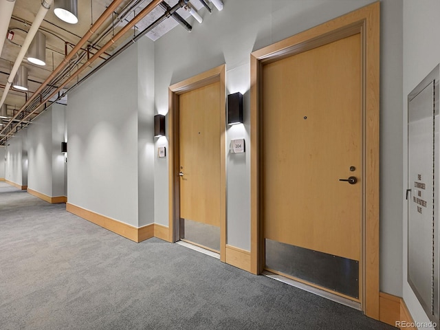 interior space featuring baseboards