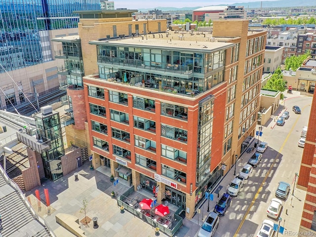 view of building exterior featuring a view of city