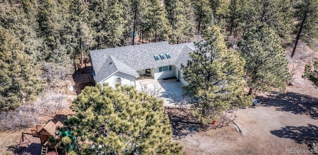 630 Rock Creek Mesa Rd, Colorado Springs, CO 80926 - drone / aerial view featuring a view of trees