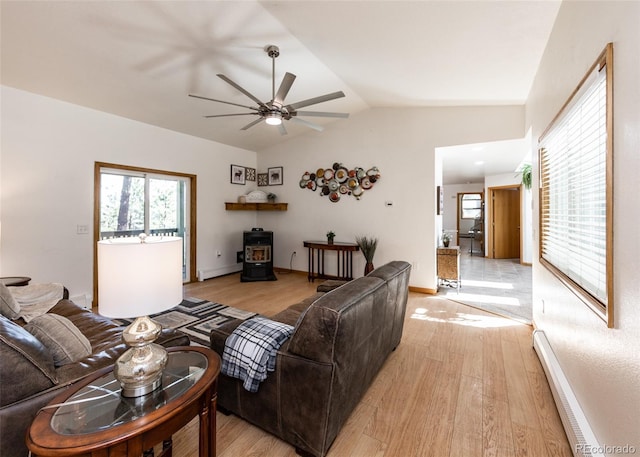 630 Rock Creek Mesa Rd, Colorado Springs, CO 80926 - living area with a wood stove, light wood-style flooring, and ceiling fan