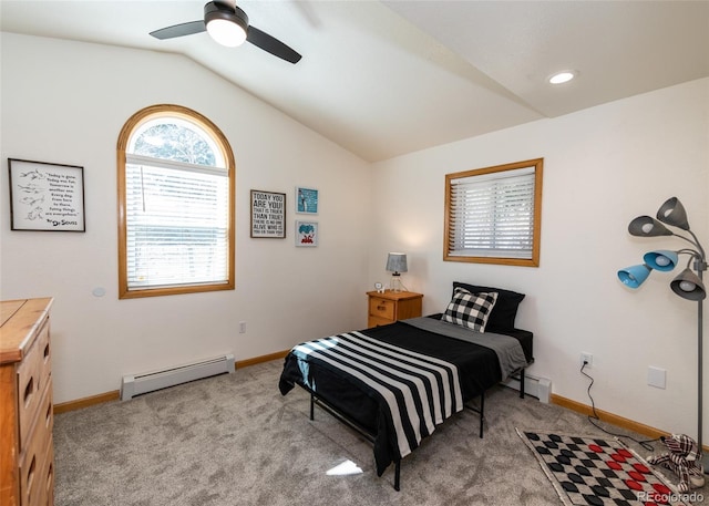 630 Rock Creek Mesa Rd, Colorado Springs, CO 80926 - carpeted bedroom with a baseboard heating unit, baseboards, and vaulted ceiling