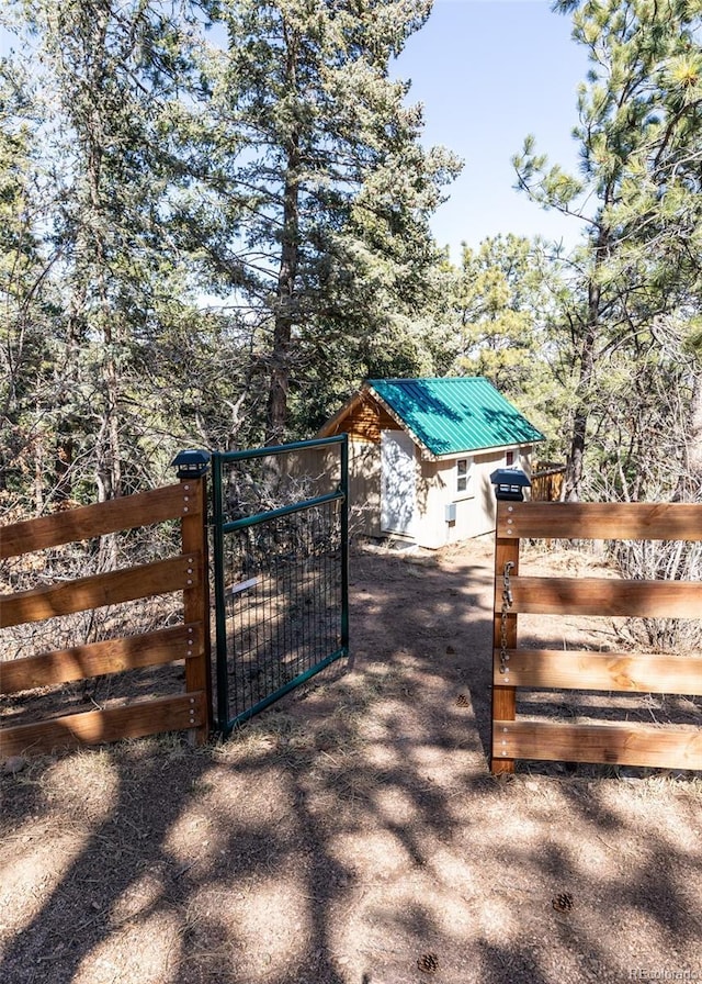 630 Rock Creek Mesa Rd, Colorado Springs, CO 80926 - view of gate featuring fence