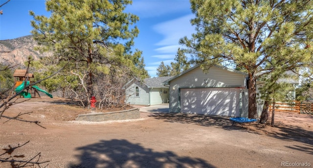 630 Rock Creek Mesa Rd, Colorado Springs, CO 80926 - exterior space with driveway and fence