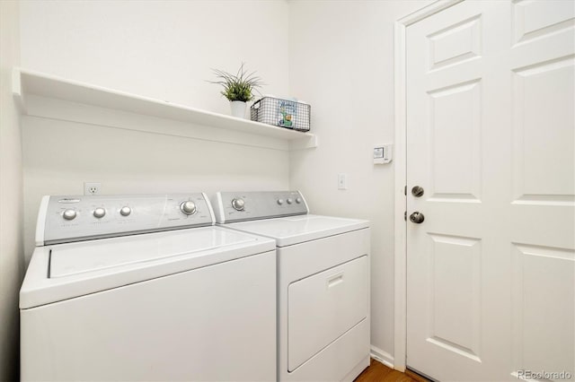 clothes washing area with laundry area and washing machine and dryer