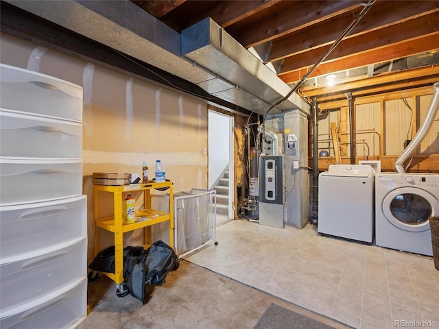 basement with washing machine and clothes dryer