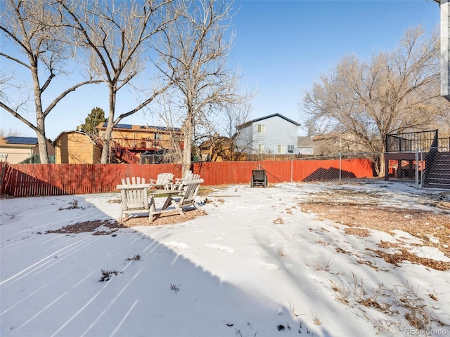 view of yard covered in snow