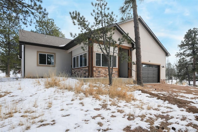 view of front of property featuring a garage