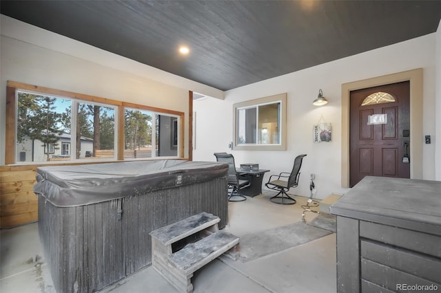 view of patio / terrace featuring a hot tub