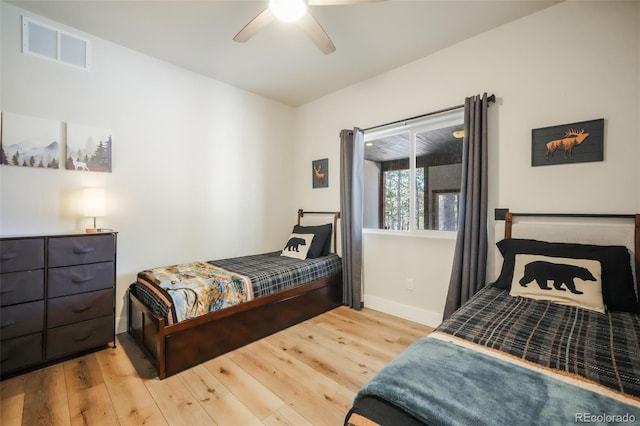 bedroom featuring wood-type flooring and ceiling fan