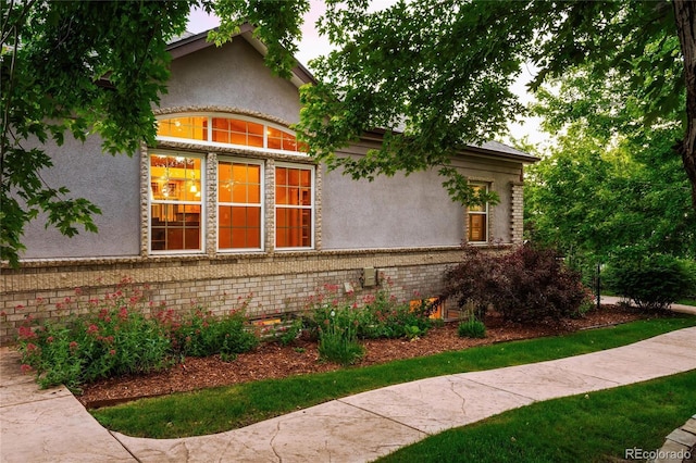 3231 Oak St, Wheat Ridge, CO 80033 - view of side of home with stucco siding and brick siding