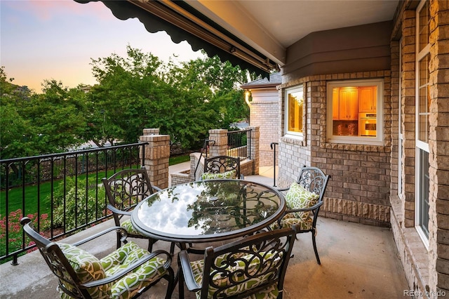 3231 Oak St, Wheat Ridge, CO 80033 - patio terrace at dusk featuring outdoor dining space