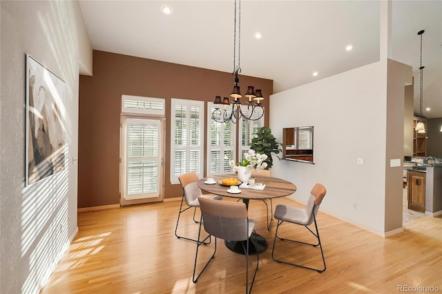 3231 Oak St, Wheat Ridge, CO 80033 - dining room featuring light wood-type flooring, a chandelier, and recessed lighting