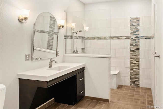 3231 Oak St, Wheat Ridge, CO 80033 - bathroom featuring vanity and walk in shower