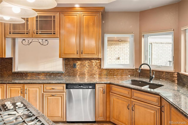 3231 Oak St, Wheat Ridge, CO 80033 - kitchen with dishwasher, tasteful backsplash, dark stone countertops, glass insert cabinets, and brown cabinets