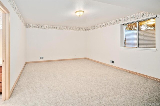 3231 Oak St, Wheat Ridge, CO 80033 - unfurnished room featuring light colored carpet and baseboards