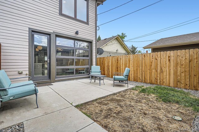 view of patio / terrace with fence