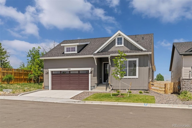 5909 S Platte Canyon Dr, Littleton, CO 80123 - craftsman-style home featuring a garage, concrete driveway, board and batten siding, and roof with shingles