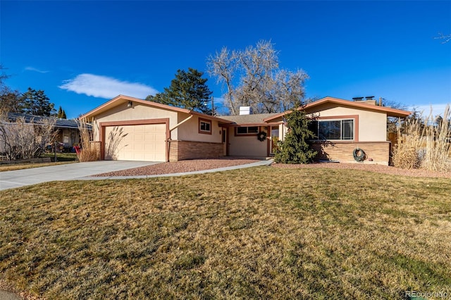 single story home with a front yard and a garage