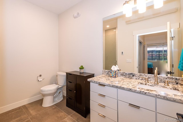 824 Grand Ave Unit 4, Grand Lake, CO 80447 - full bath with toilet, tile patterned floors, vanity, and baseboards