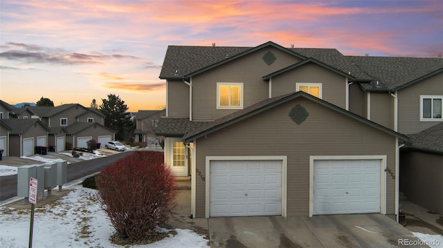 front of property with a garage