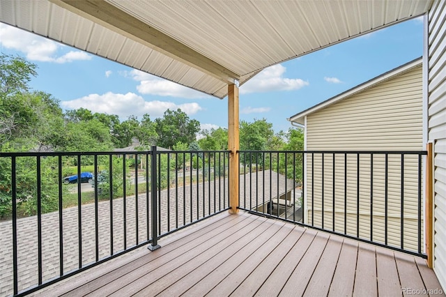 7825 Barbara Ann Dr Unit I, Arvada, CO 80004 - wooden deck with view of wooded area