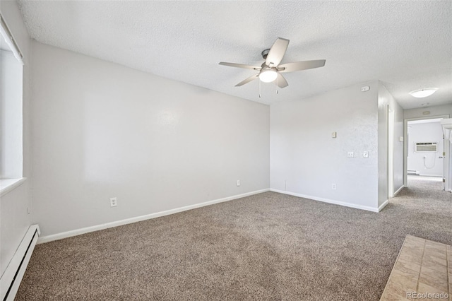 7825 Barbara Ann Dr Unit I, Arvada, CO 80004 - carpeted spare room with a baseboard radiator, a ceiling fan, a textured ceiling, a wall unit AC, and baseboard heating