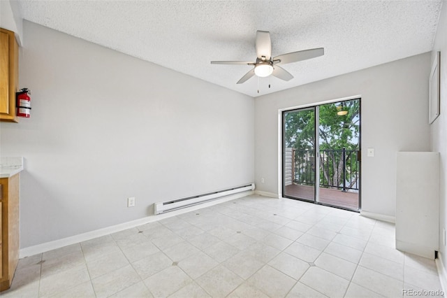 7825 Barbara Ann Dr Unit I, Arvada, CO 80004 - spare room with a baseboard heating unit, a ceiling fan, and a textured ceiling