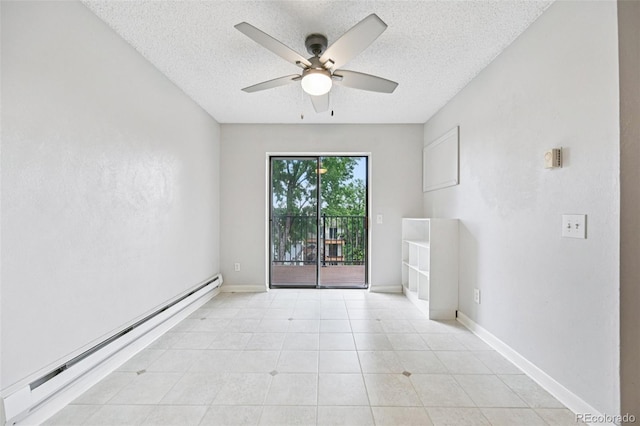 7825 Barbara Ann Dr Unit I, Arvada, CO 80004 - empty room with baseboard heating, a ceiling fan, a textured ceiling, and light tile patterned floors