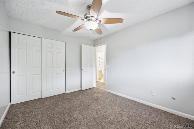 7825 Barbara Ann Dr Unit I, Arvada, CO 80004 - unfurnished bedroom with carpet flooring, a closet, ceiling fan, and a textured ceiling