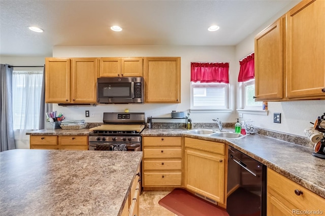 5770 Waverley Ave, Firestone, CO 80504 - kitchen with stainless steel appliances, a sink, and recessed lighting
